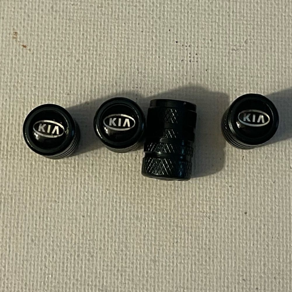 Kia valve Stem caps in black Set of 4 NWT
